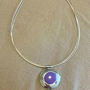 Silver tone necklace with light purple pendant
